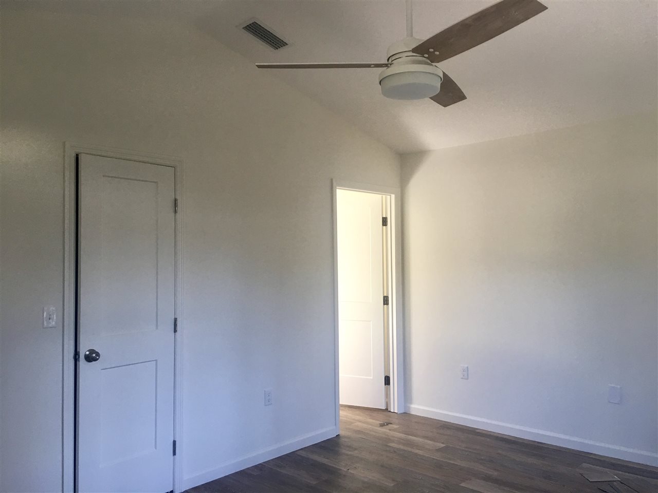 201 Spring Street St. Augustine, FL 32084 - Photo 13 of 18 a view of a room with wooden floor