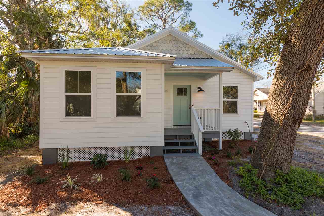 201 Spring Street St. Augustine, FL 32084 - Photo 3 of 18 a view of a house with a yard