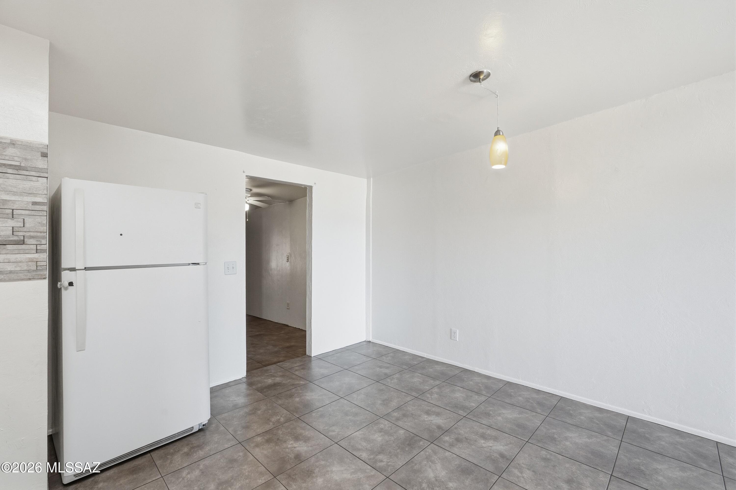 1808 West Caravelle Road Tucson, AZ 85713 - Photo 17 of 38 a view of an empty room