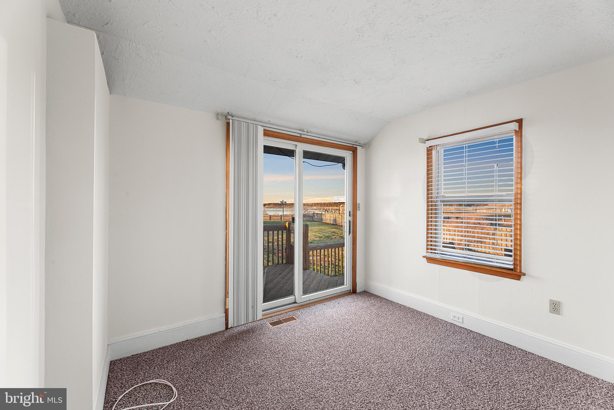 1252 Old Madison Road Madison, MD 21648 - Photo 74 of 90 Primary bedroom with deck access