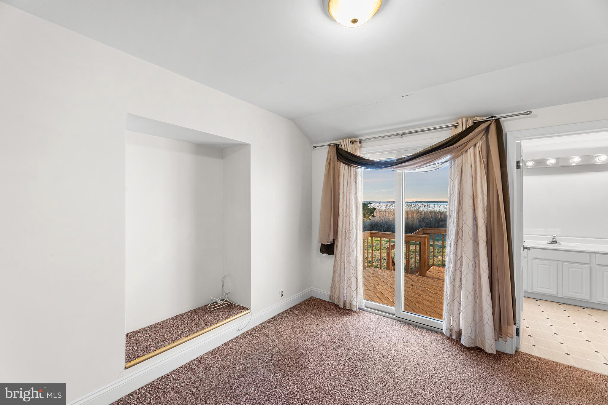 1252 Old Madison Road Madison, MD 21648 - Photo 80 of 90 Secondary bedroom with deck access