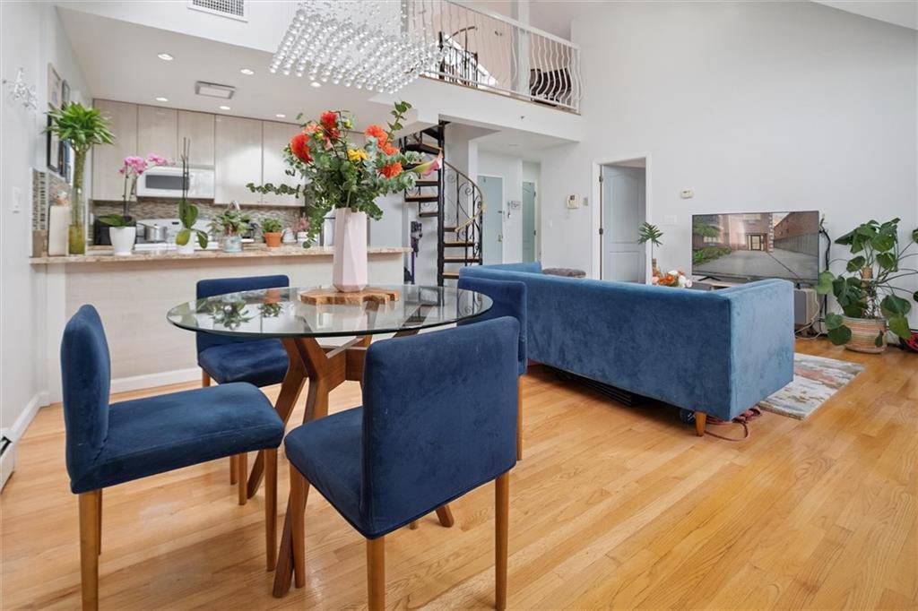 1523 74th Street, Unit 3F Brooklyn, NY 11228 - Photo 3 of 20 a living room with furniture and a potted plant