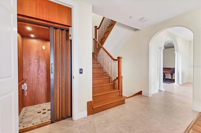 a view of an entryway with staircase