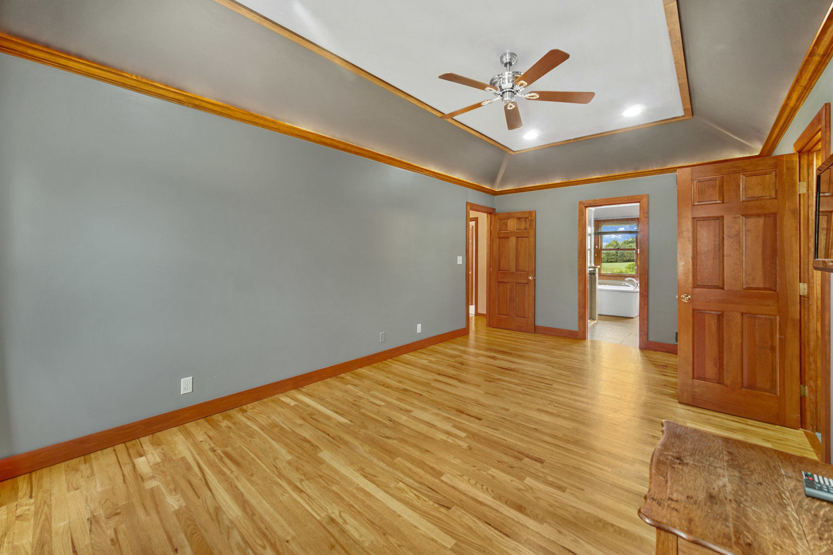 6 Red Hawk Drive Oswego, IL 60543 - Photo 19 of 41 a view of room with ceiling fan and wooden floor
