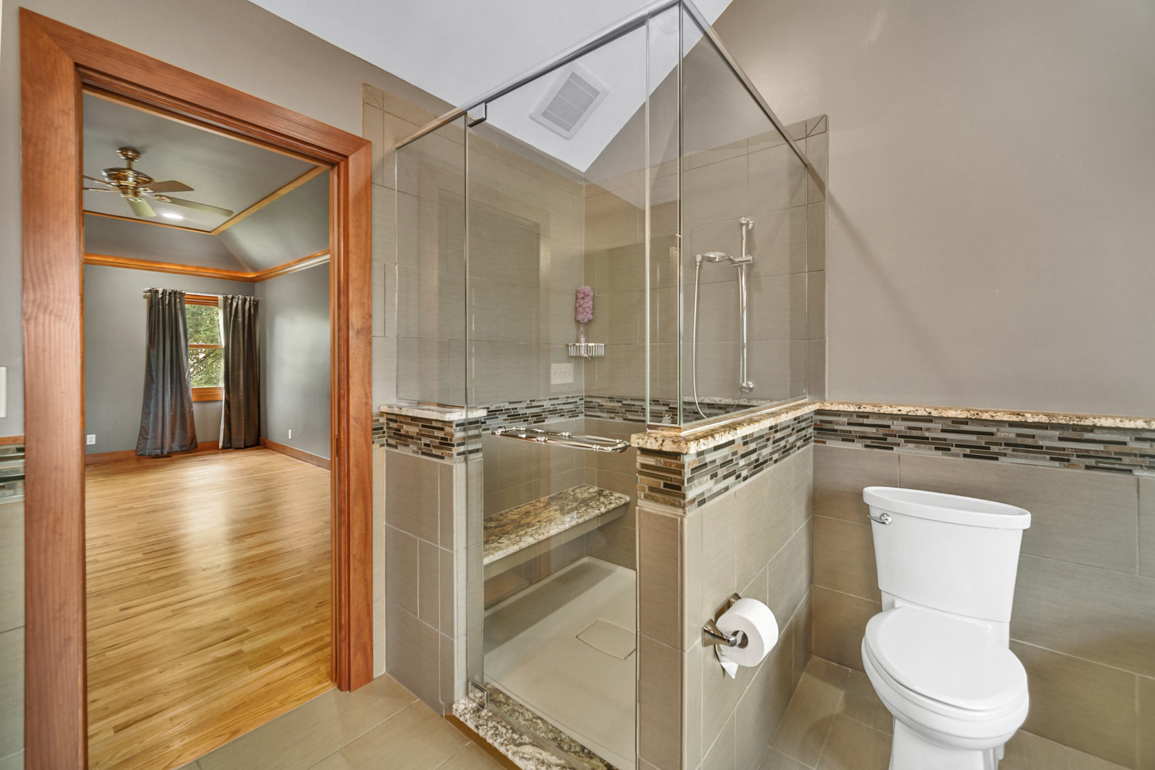 6 Red Hawk Drive Oswego, IL 60543 - Photo 21 of 41 a bathroom with a shower a toilet and a sink