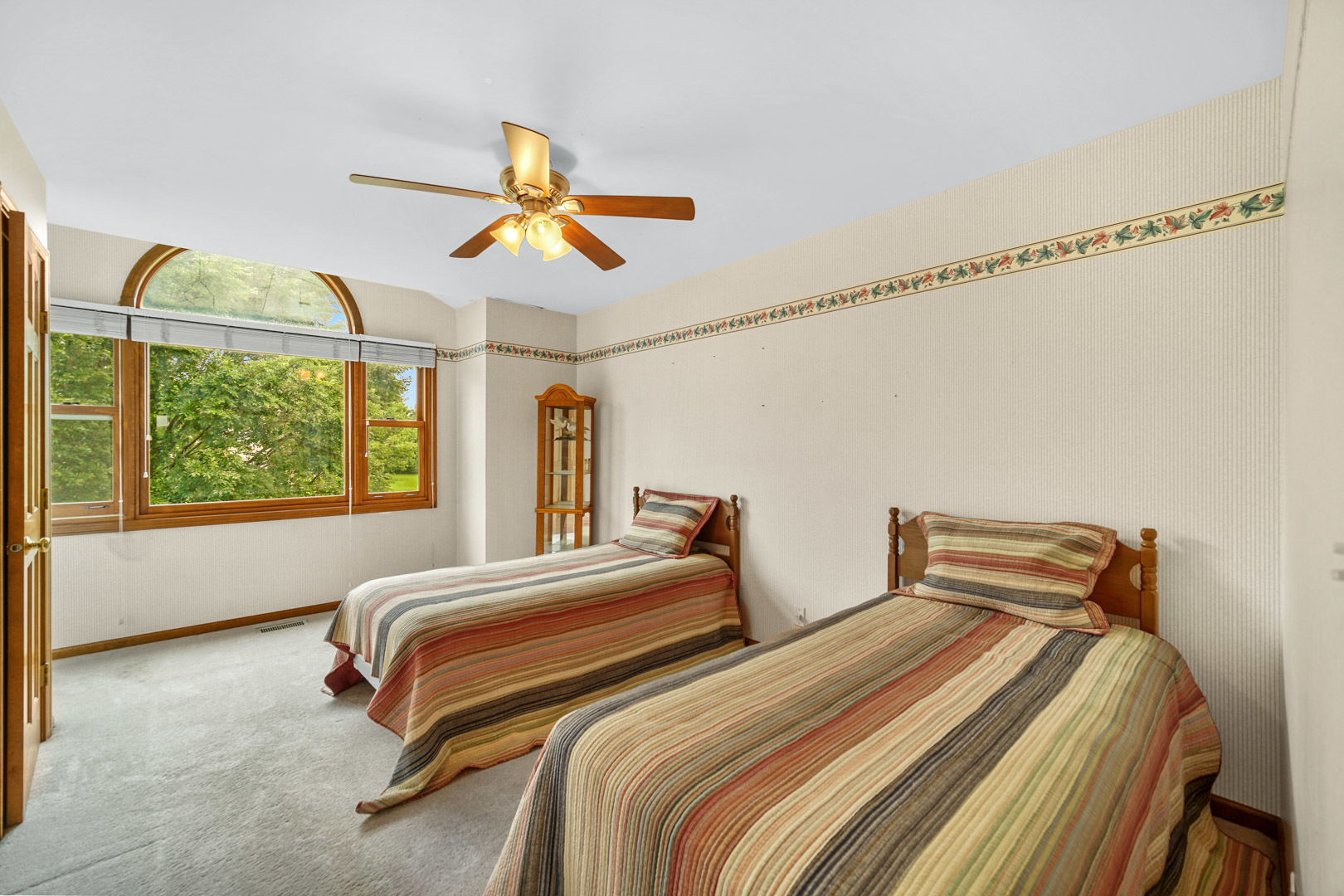 6 Red Hawk Drive Oswego, IL 60543 - Photo 24 of 41 a bedroom with two beds and a window