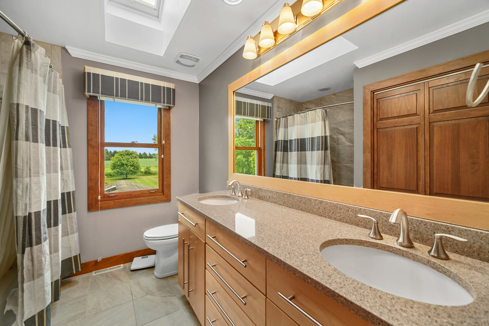 6 Red Hawk Drive Oswego, IL 60543 - Photo 26 of 41 a bathroom with a granite countertop sink and a large mirror