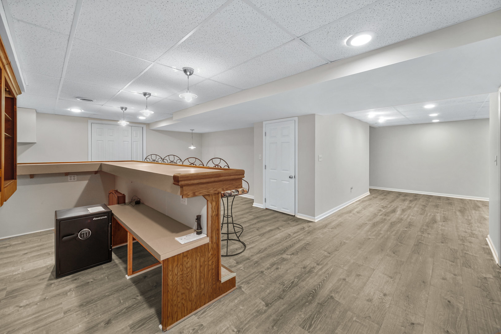 6 Red Hawk Drive Oswego, IL 60543 - Photo 28 of 41 a view of a room with wooden floor and chairs