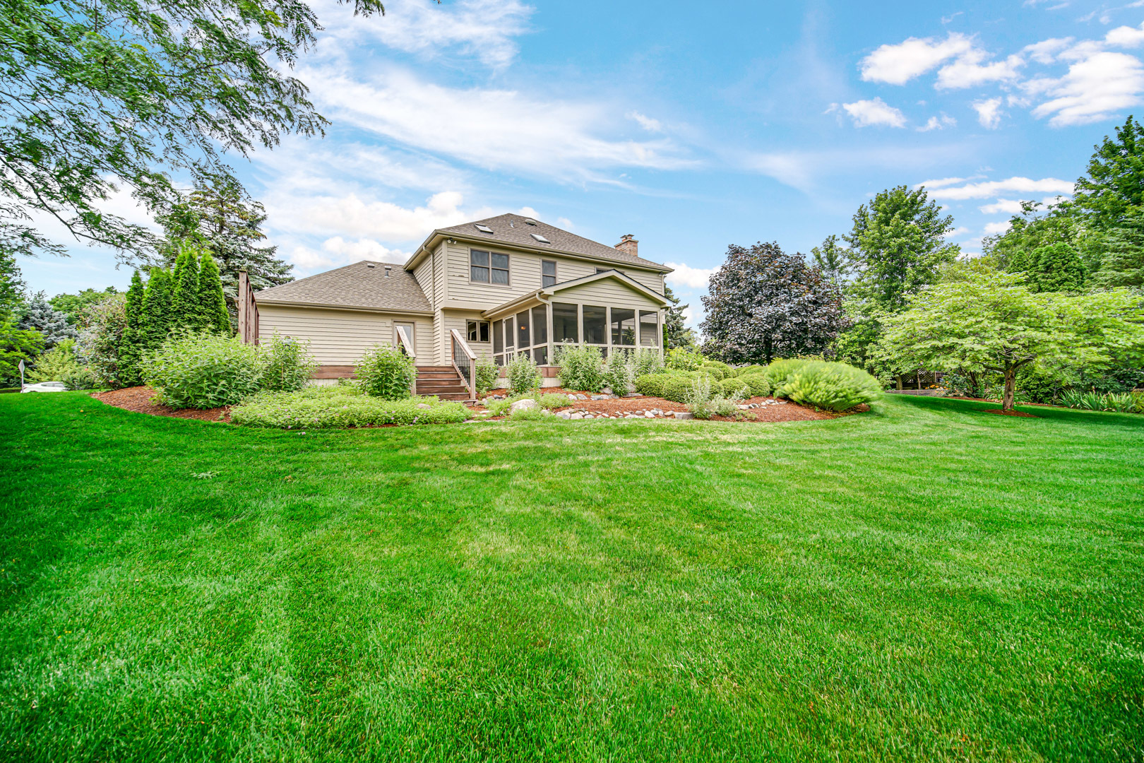 6 Red Hawk Drive Oswego, IL 60543 - Photo 33 of 41 a front view of a house with a garden and trees
