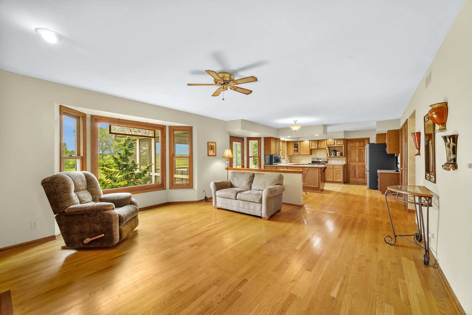 6 Red Hawk Drive Oswego, IL 60543 - Photo 4 of 41 a living room with furniture and a large window