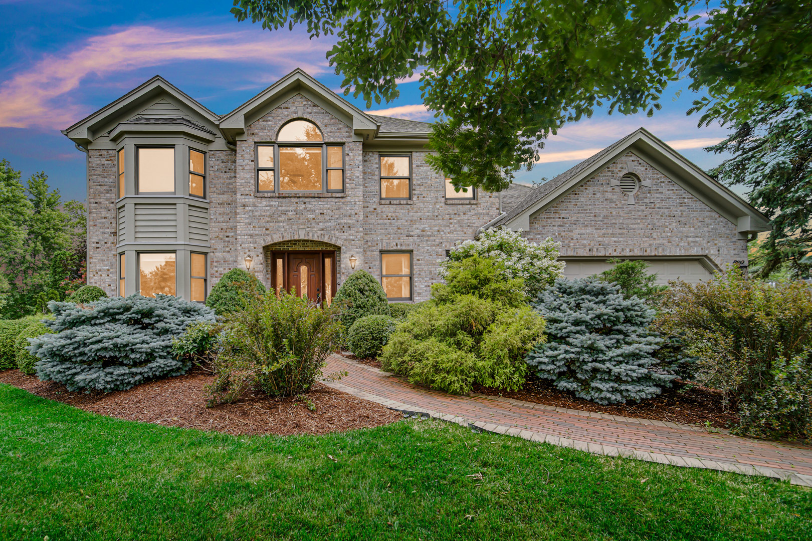 6 Red Hawk Drive Oswego, IL 60543 - Photo 41 of 41 a front view of a house with a yard and garage
