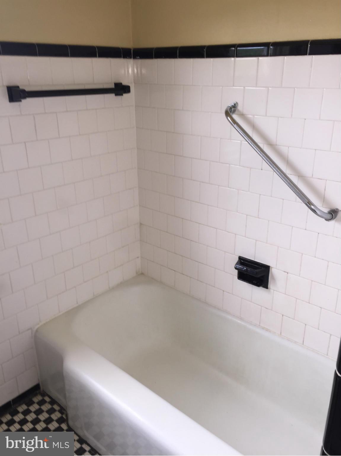 1616 Thetford Road Towson, MD 21286 - Photo 12 of 13 a bathroom with a bathtub