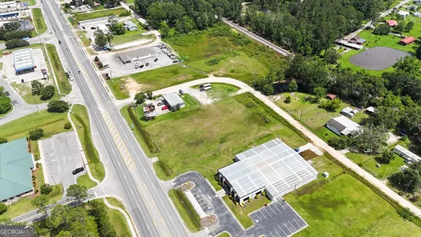 a view of swimming pool with a yard