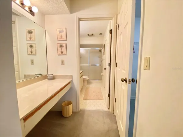 a bathroom with a tub and shower