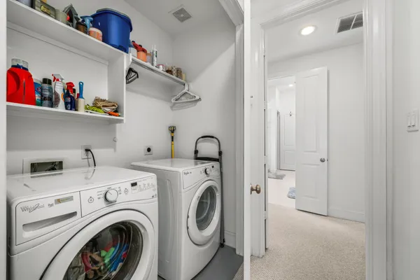 a view of washer and dryer in a utility room