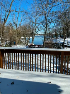 a room with furniture and gym equipment