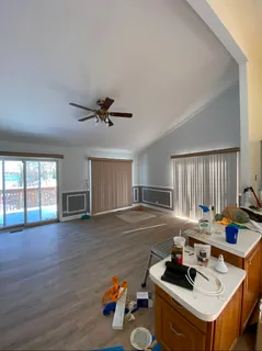 a room with furniture and a wooden floor