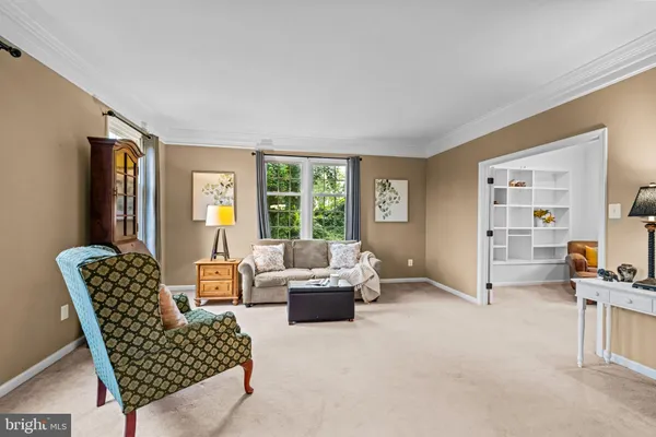 a room with furniture and a window