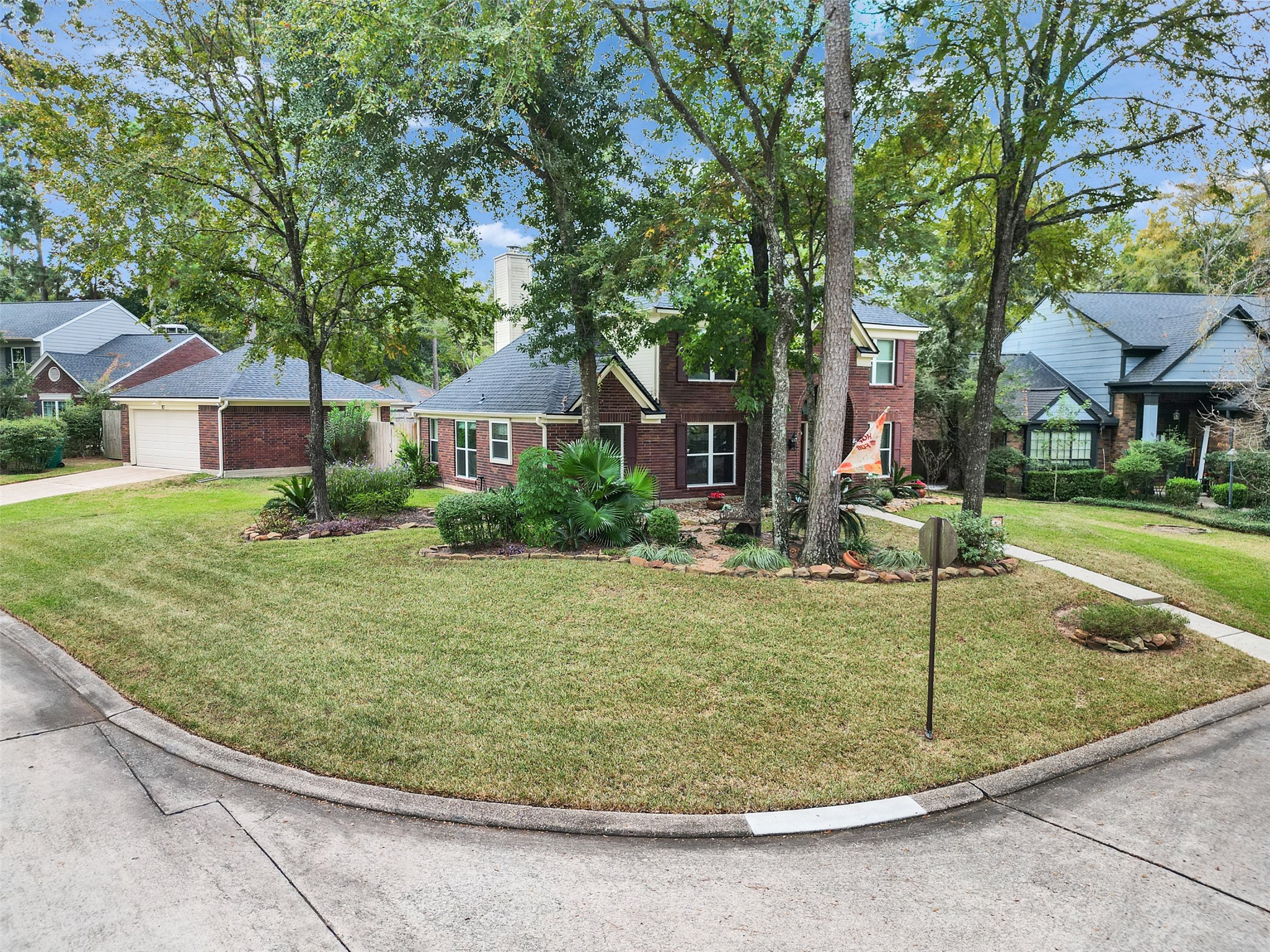 87 South Copper Sage Circle Spring, TX 77381 - Photo 27 of 28 Exceptional two-story brick home on a spacious corner lot with mature trees and well-maintained landscaping.