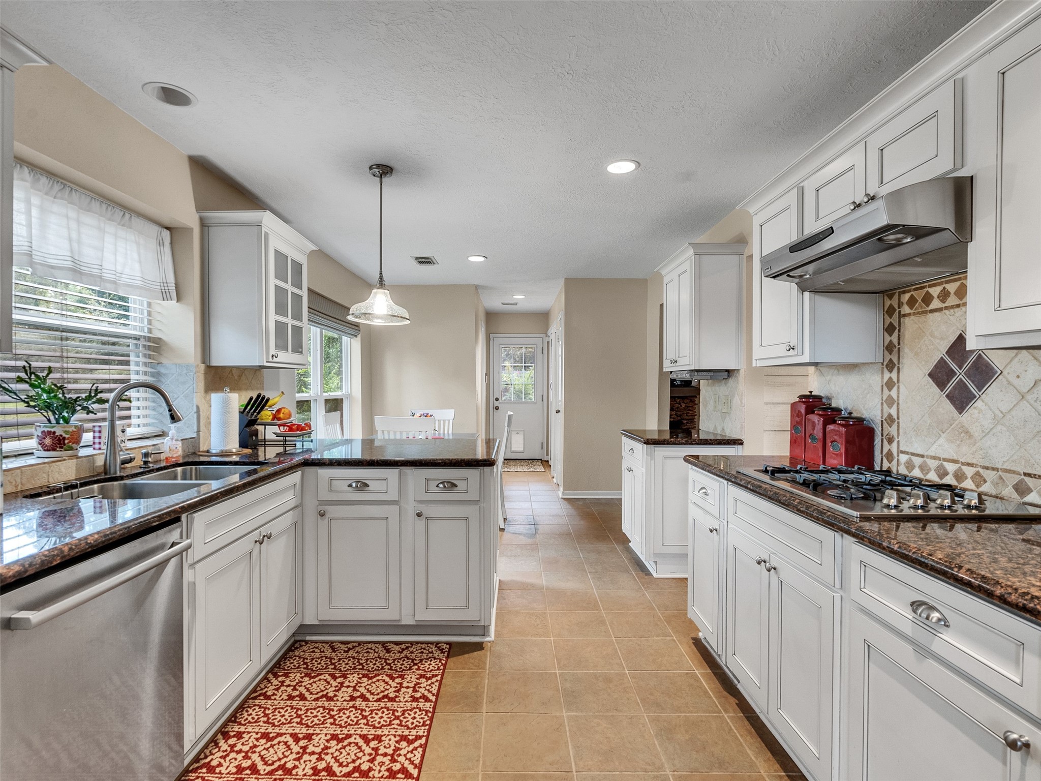 87 South Copper Sage Circle Spring, TX 77381 - Photo 7 of 28 Bright kitchen with plenty of space to cook, snack, and hang out.