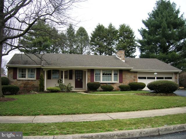 505 Bluebird Road Lititz, PA 17543 - Photo 1 of 14 a front view of a house with a garden