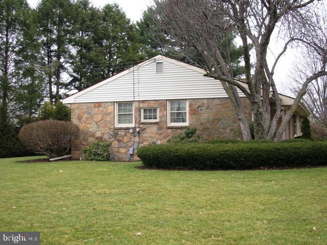 505 Bluebird Road Lititz, PA 17543 - Photo 13 of 14 a view of a house with a garden
