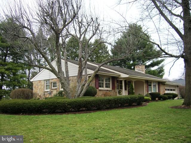 505 Bluebird Road Lititz, PA 17543 - Photo 4 of 14 a front view of a house with a yard and trees