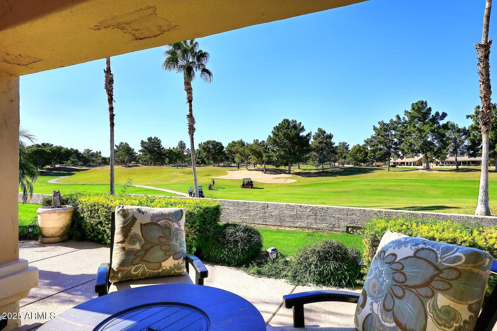 a view of a swimming pool and outdoor space