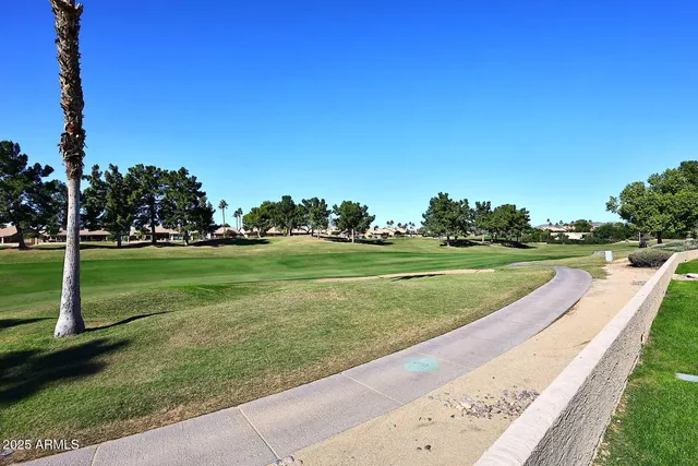 a view of a golf course with a garden