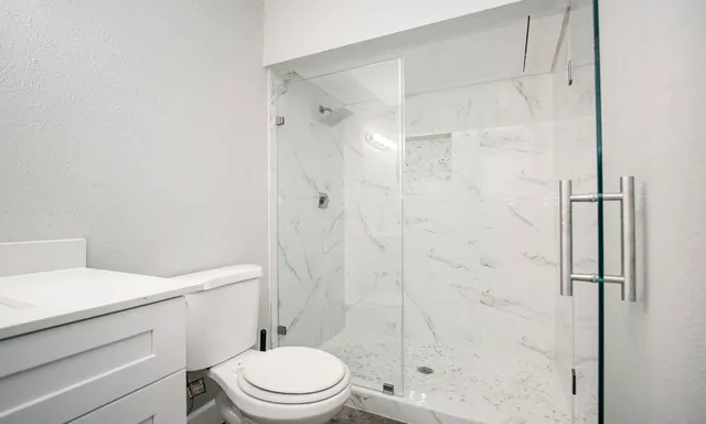 a view of a room with racks on the wall