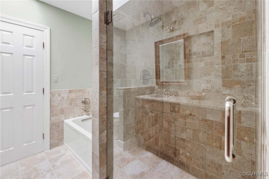 3831 Reeds Landing Circle Midlothian, VA 23113 - Photo 26 of 50 a bathroom with a granite countertop shower