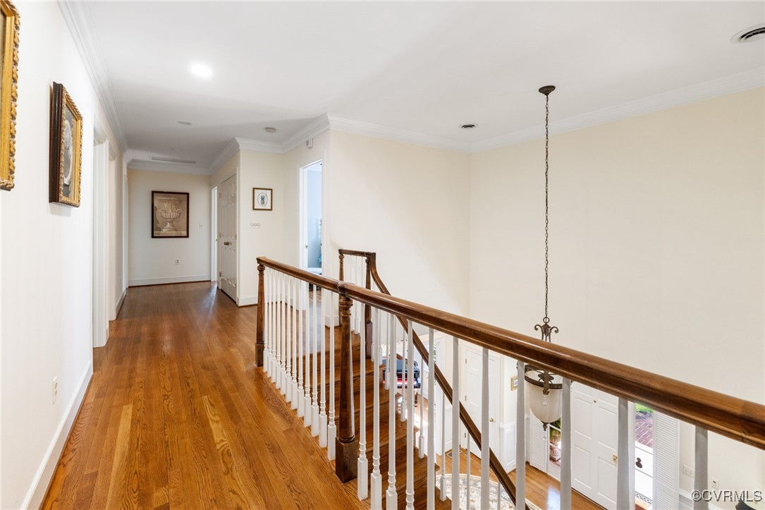 3831 Reeds Landing Circle Midlothian, VA 23113 - Photo 36 of 50 a view of a hallway with wooden floor and stairs