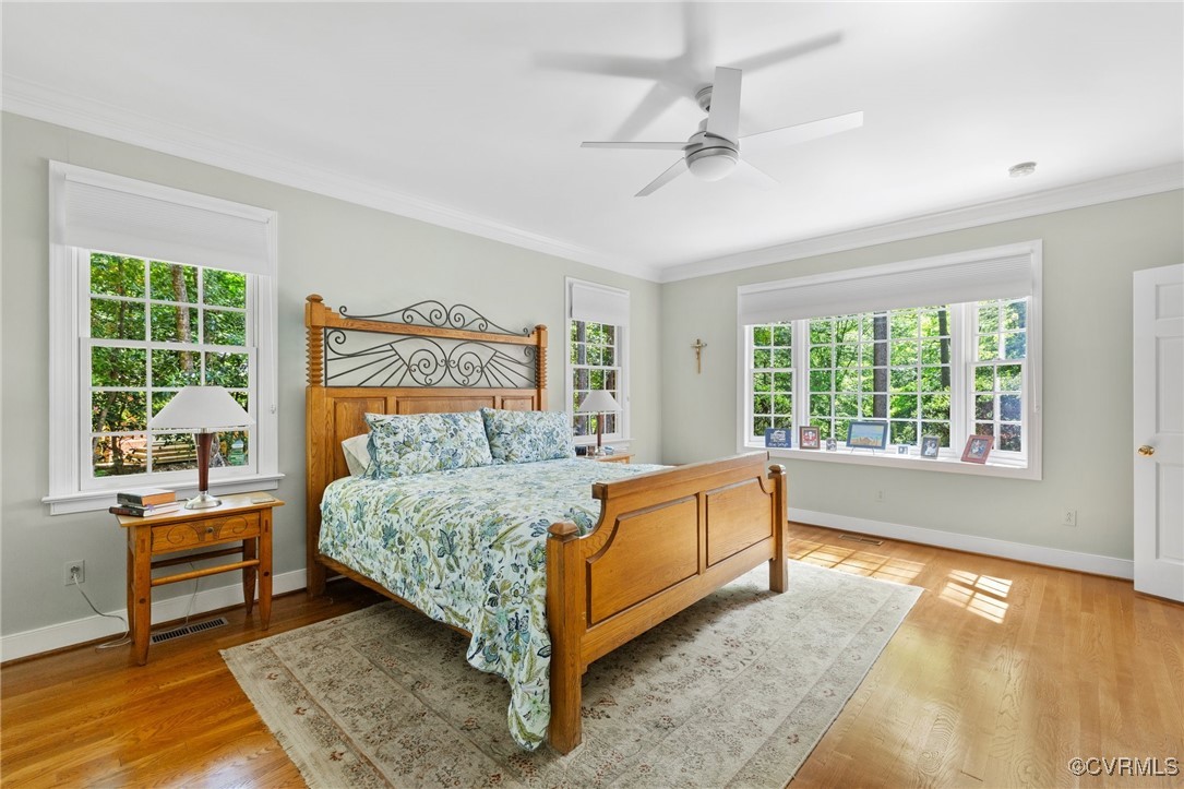 3831 Reeds Landing Circle Midlothian, VA 23113 - Photo 38 of 50 a bed sitting in a spacious bedroom next to a window