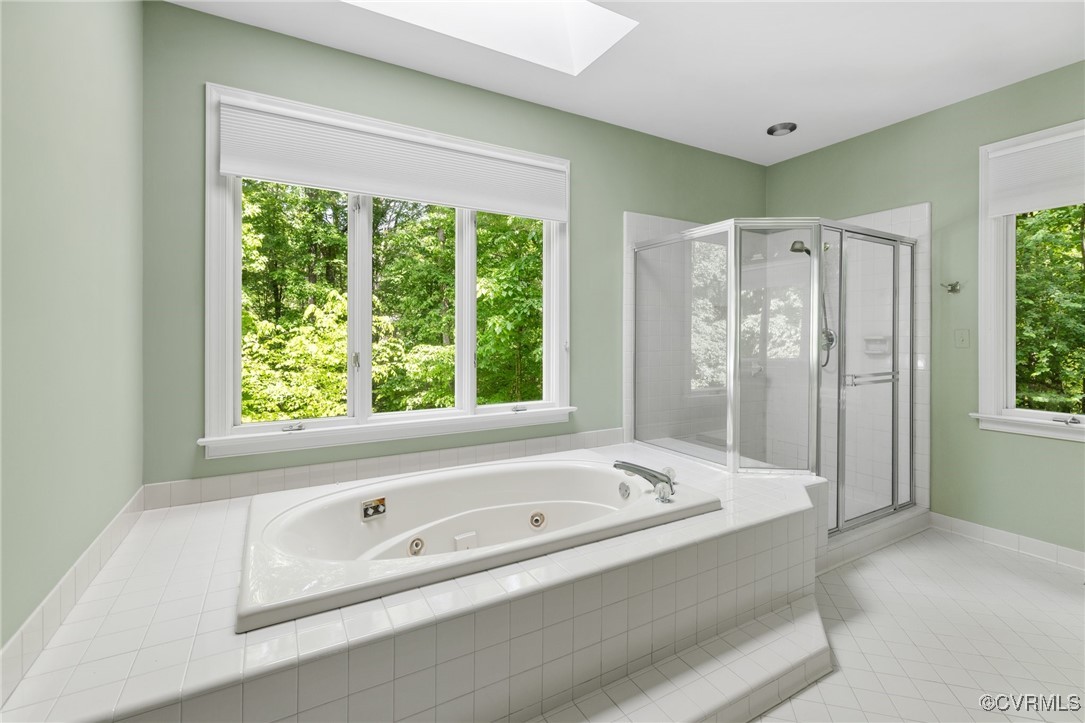 3831 Reeds Landing Circle Midlothian, VA 23113 - Photo 39 of 50 a bathroom with a bathtub and a sink