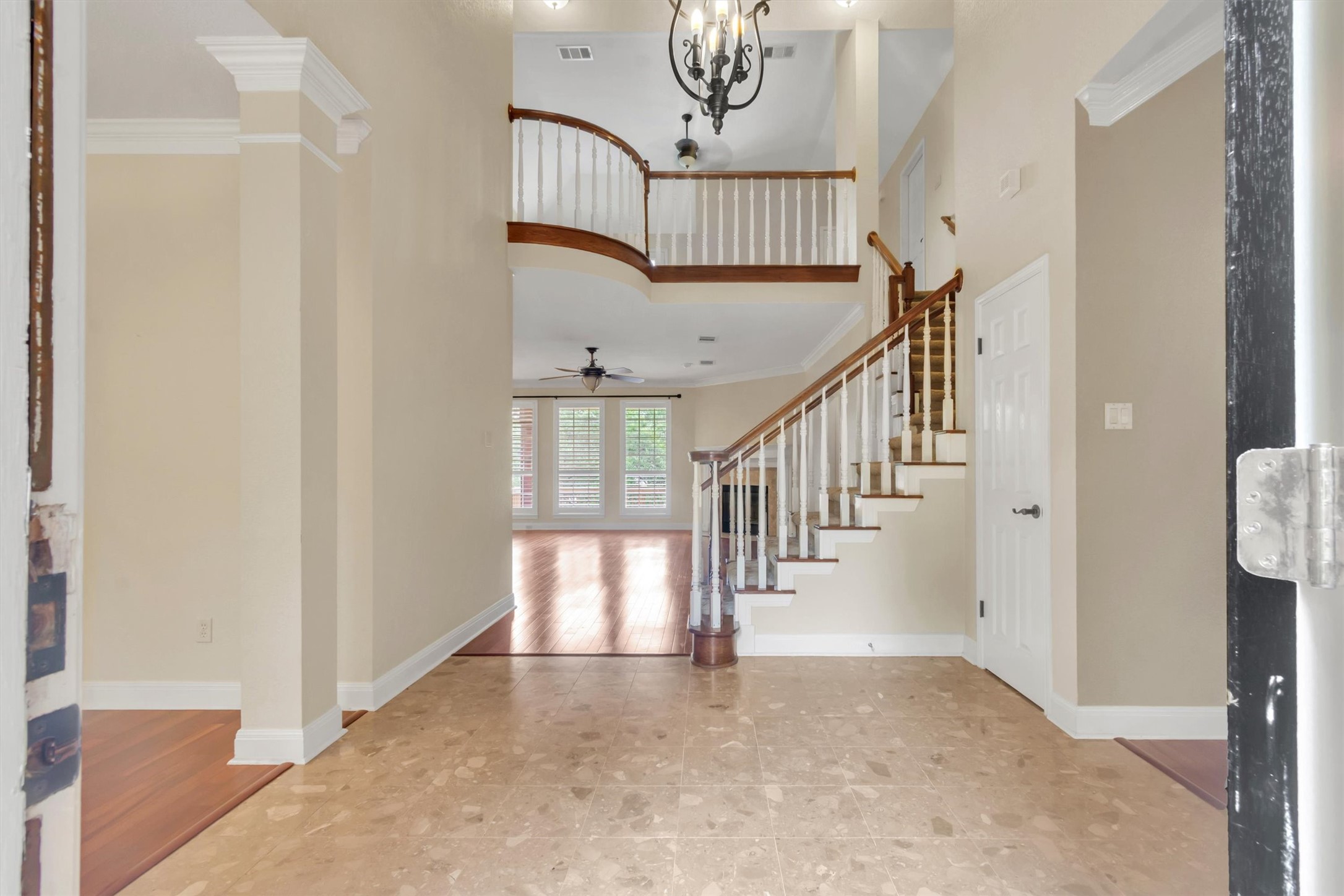 6008 Tributary Ridge Court Austin, TX 78759 - Photo 36 of 36 A grand entry foyer welcomes all with high ceilings, an elegant staircase, and a graceful second-story overlook.