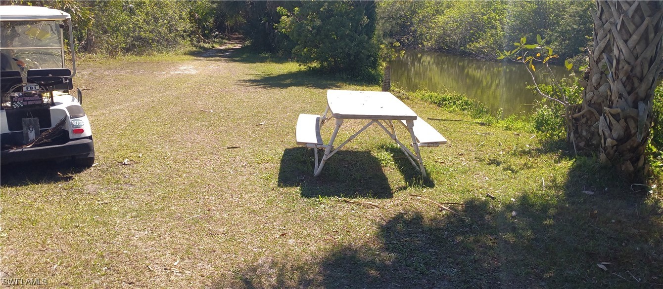 1159 Daniels Road Moore Haven, FL 33471 - Photo 13 of 21 a picture of a lake view