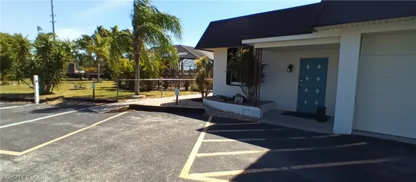 a view of a patio with couches and potted plants