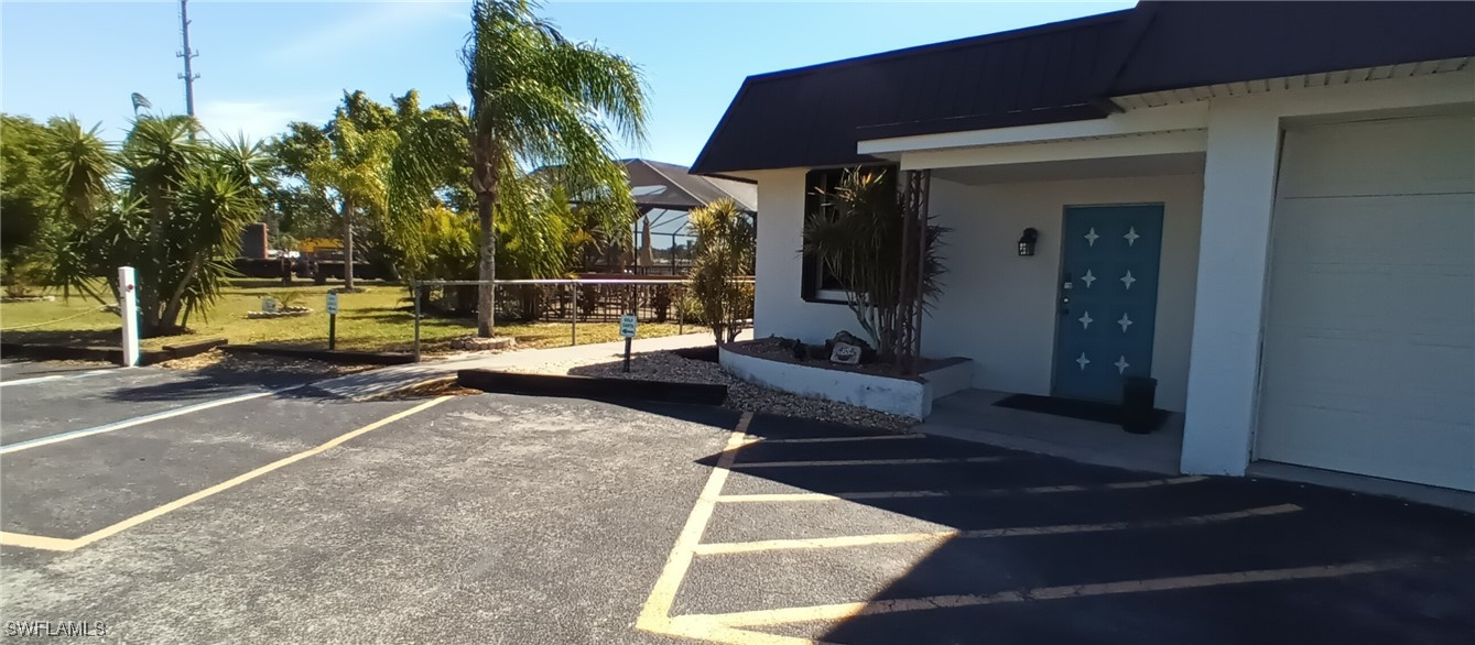 1159 Daniels Road Moore Haven, FL 33471 - Photo 17 of 21 a view of a patio with couches and potted plants
