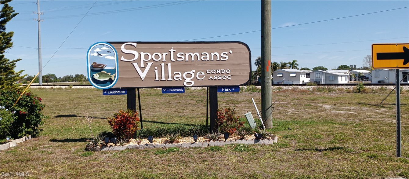 1159 Daniels Road Moore Haven, FL 33471 - Photo 20 of 21 a sign on the side of a building