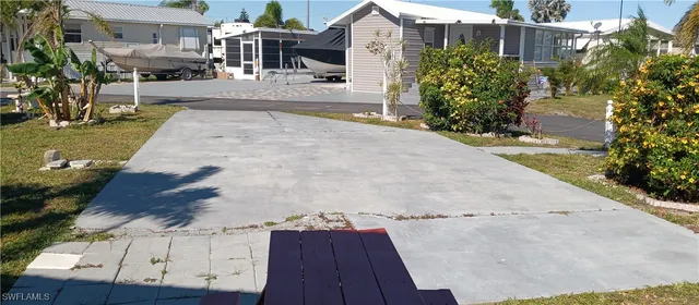 a view of yard with large trees