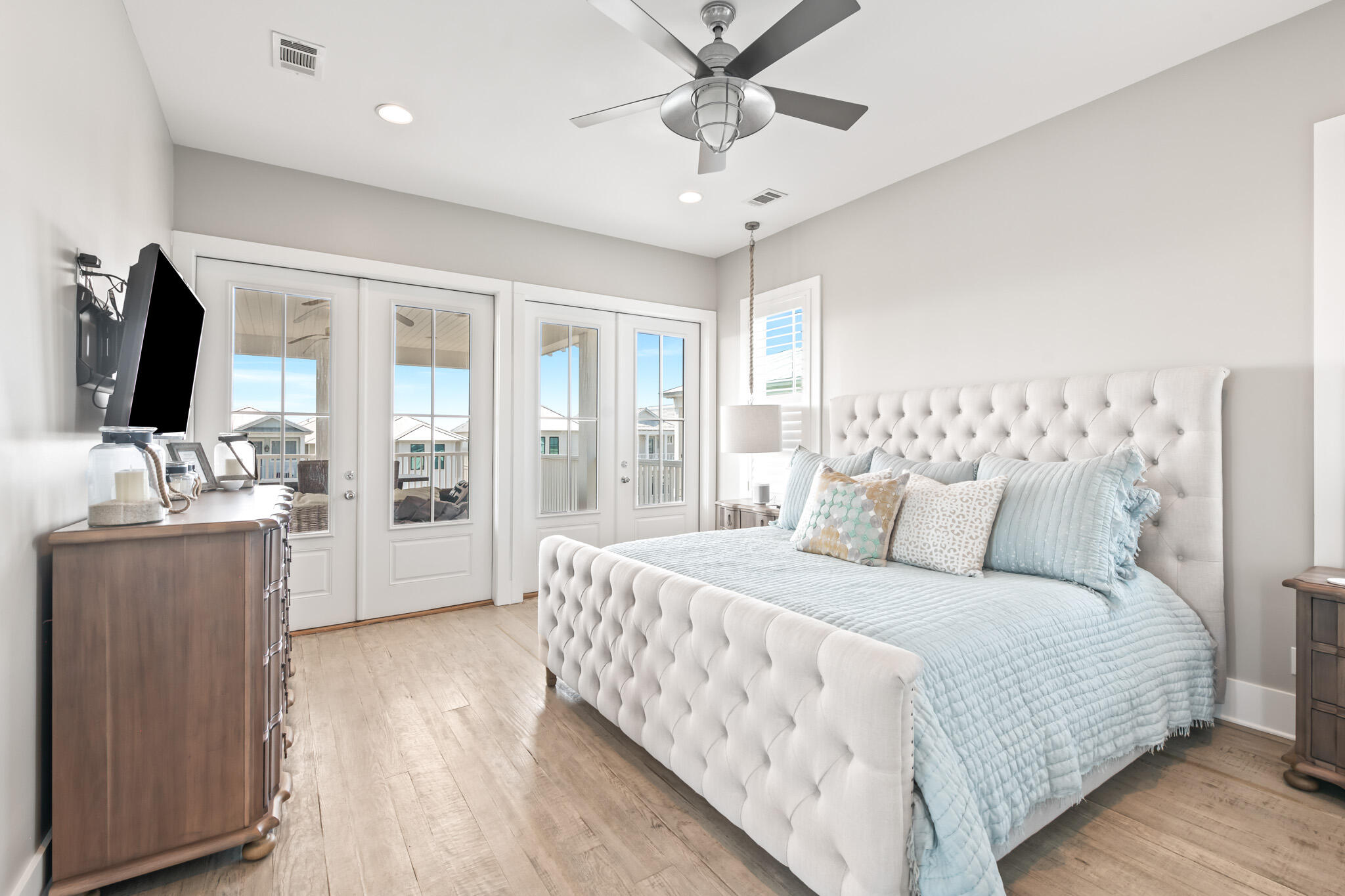 11 Pompano Pl Inlet Beach Inlet Beach, FL 32461 - Photo 12 of 68 a bedroom with a large bed and a chandelier