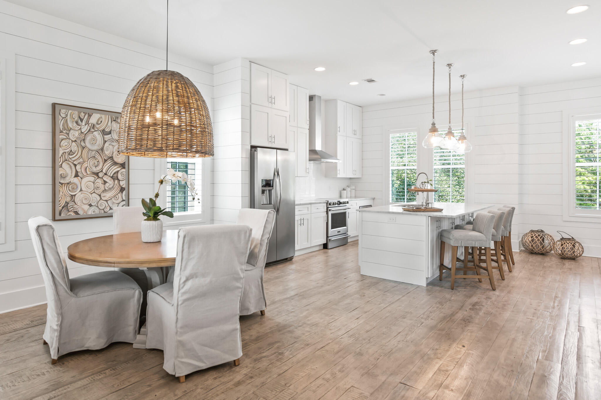 11 Pompano Pl Inlet Beach Inlet Beach, FL 32461 - Photo 30 of 68 a dining room with furniture a chandelier and wooden floor