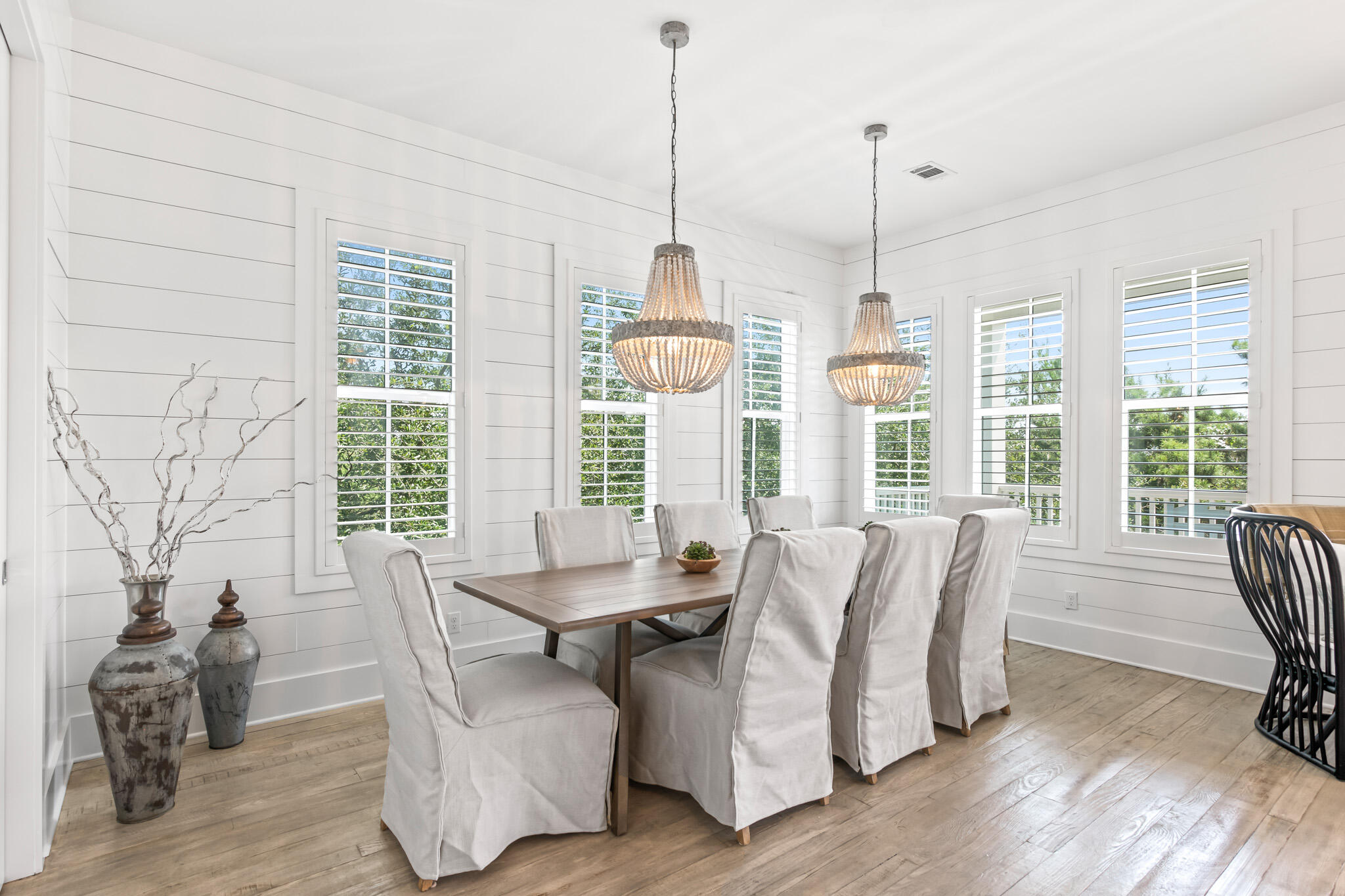 11 Pompano Pl Inlet Beach Inlet Beach, FL 32461 - Photo 41 of 68 a dining room with furniture a chandelier and wooden floor