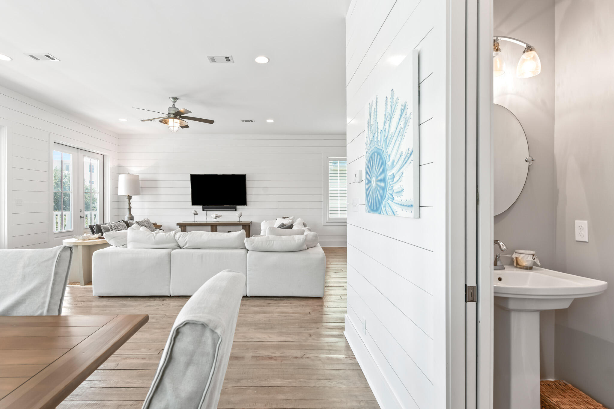 11 Pompano Pl Inlet Beach Inlet Beach, FL 32461 - Photo 42 of 68 a view of living room with furniture a flat screen tv and a view of kitchen