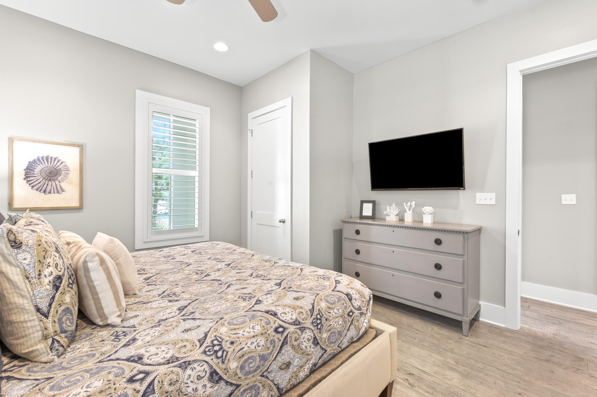 11 Pompano Pl Inlet Beach Inlet Beach, FL 32461 - Photo 56 of 68 a bedroom with a bed and a flat screen tv in it