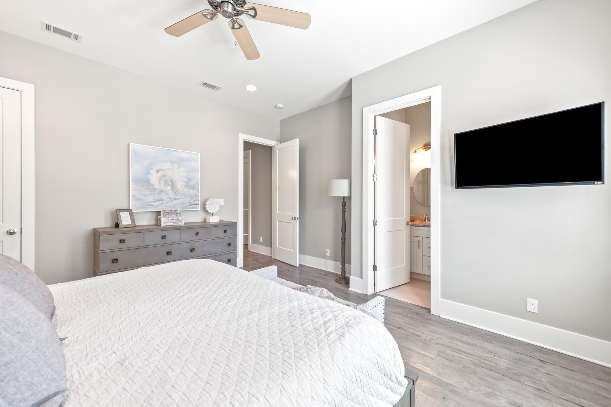 11 Pompano Pl Inlet Beach Inlet Beach, FL 32461 - Photo 59 of 68 a spacious bedroom with a bed and a flat screen tv