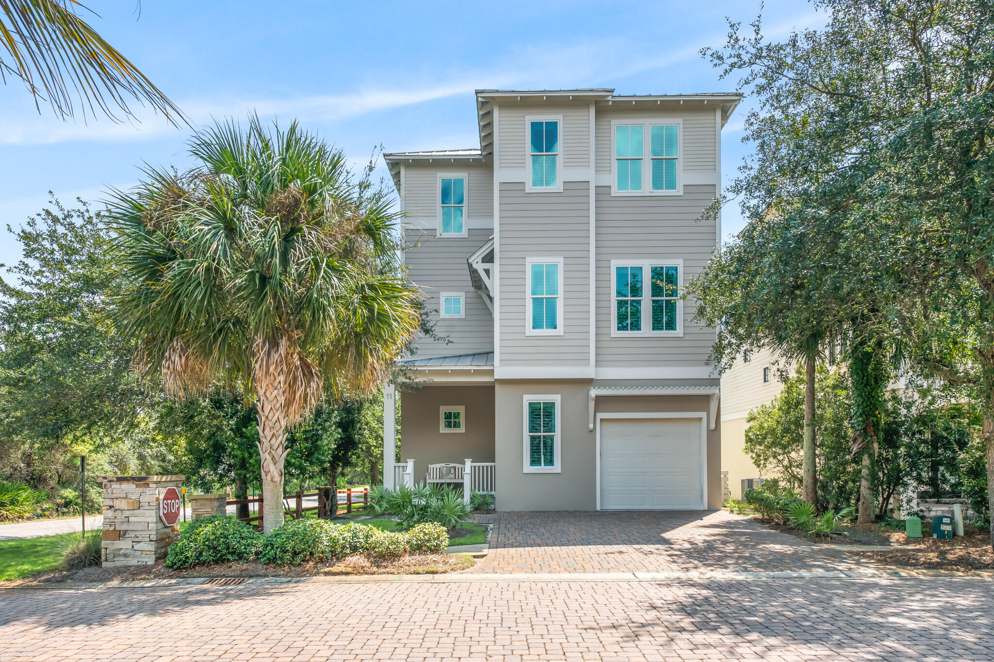 11 Pompano Pl Inlet Beach Inlet Beach, FL 32461 - Photo 63 of 68 a front view of a house with a yard and trees
