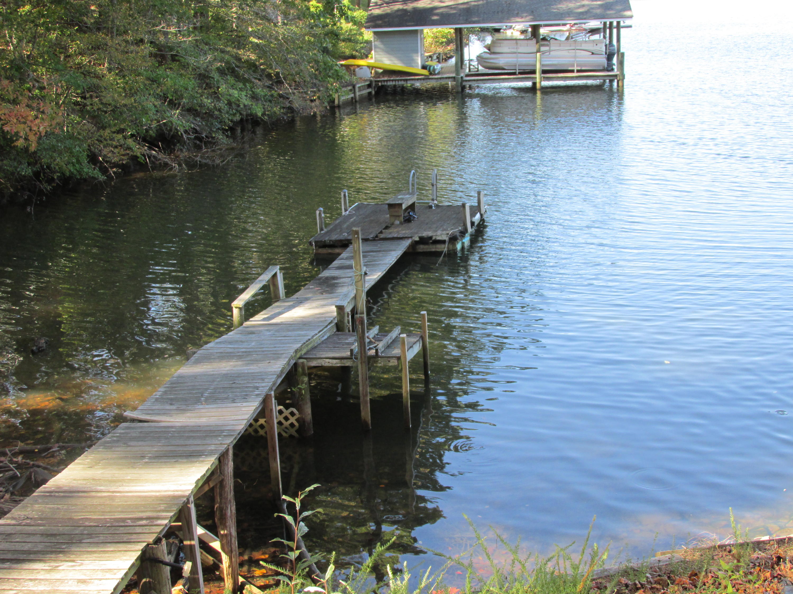 4 Oak Ridge Road Union Hall, VA 24176 - Photo 20 of 20 a view of a lake with chairs