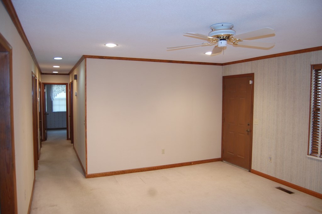 937 County Road 181 Decatur, TN 37322 - Photo 27 of 52 a view of an empty room with a chandelier fan