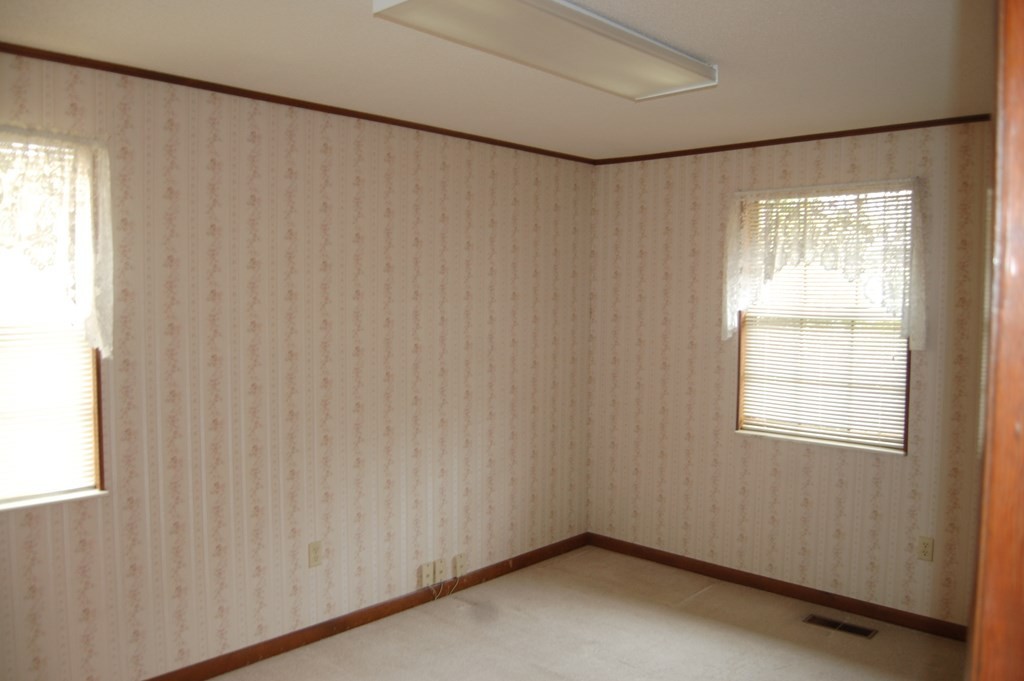 937 County Road 181 Decatur, TN 37322 - Photo 30 of 52 a view of a room with a window and a wooden floor
